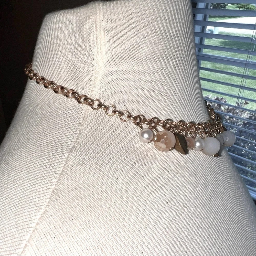 Elegant Gold and White Beaded Necklace